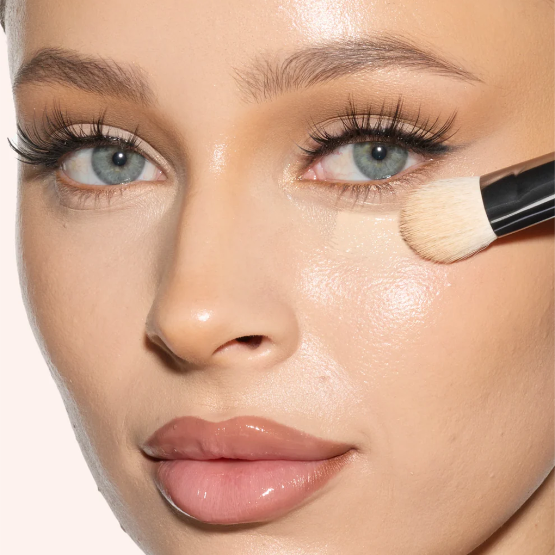 Close-up of Huda Beauty Undereye Buff Brush with soft, dense bristles