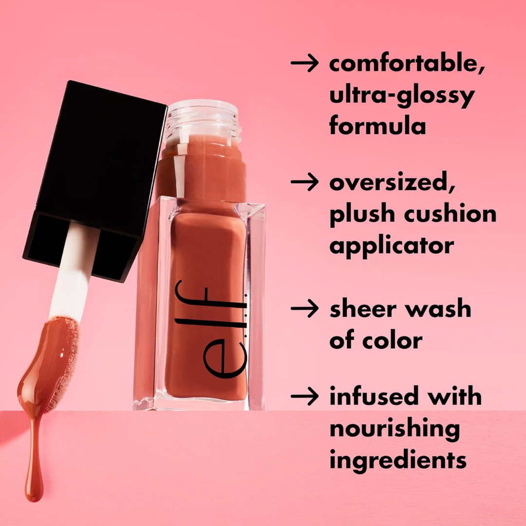 Swatch of e.l.f. Glow Reviver Lip Oil Crystal Clear on skin showing sheer, glossy shine

