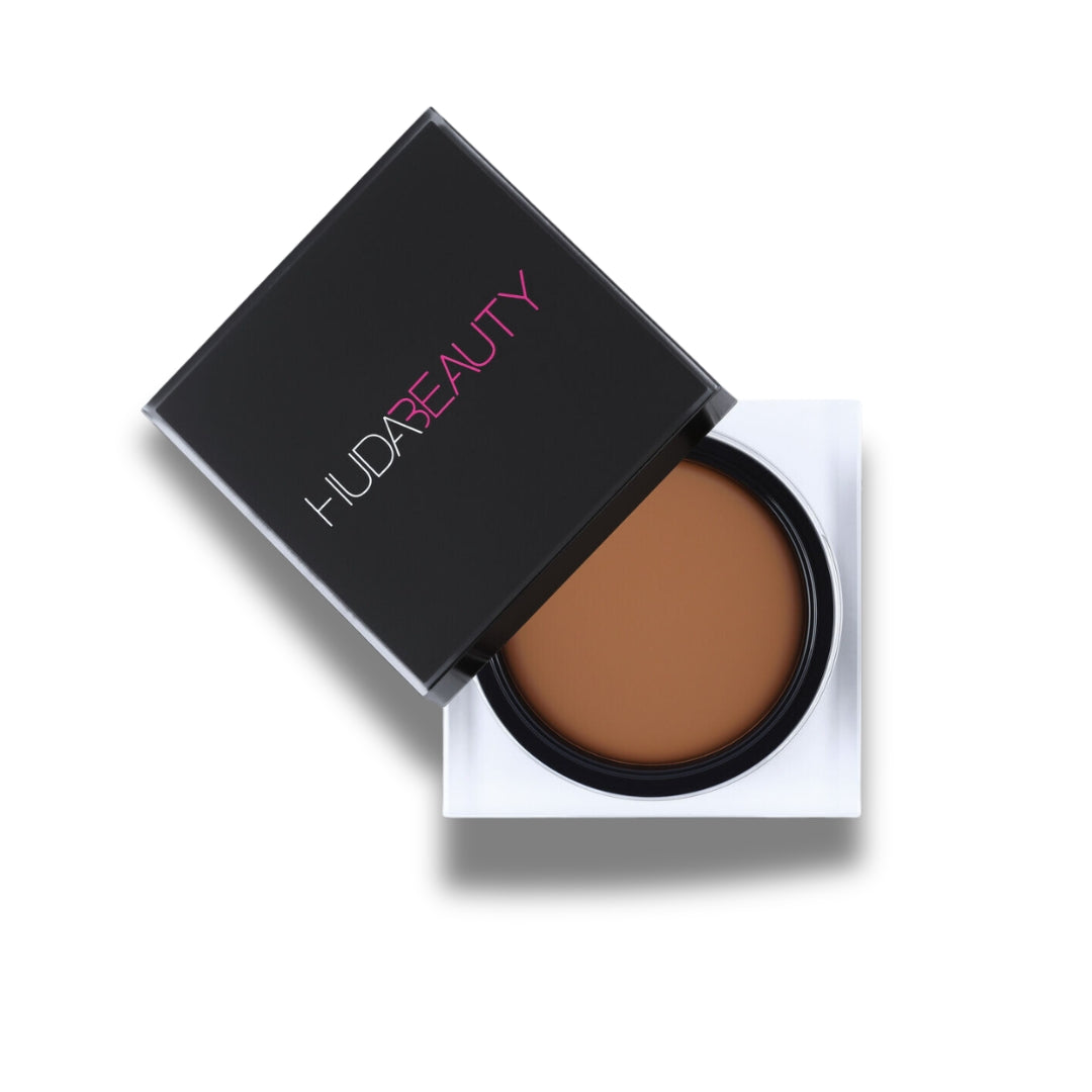 "Huda Beauty Tantour Contour & Bronzer Cream in 11g packaging with sleek black design."
