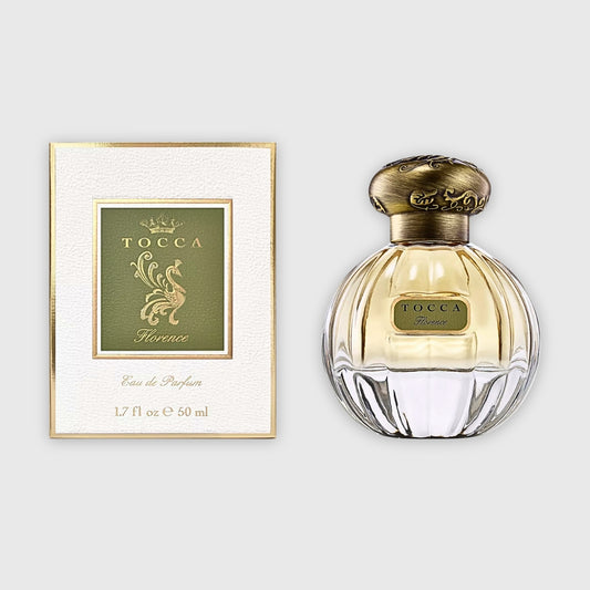 TOCCA Florence perfume travel size on white background
